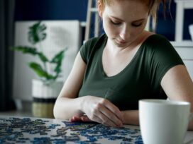Bored woman over a puzzle game