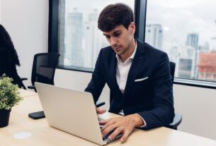 Business people using smart phone or computer for Chat GPT Chat with AI or Artificial Intelligence.